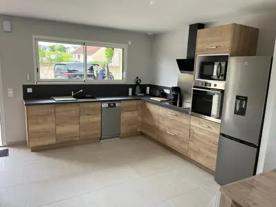 Cuisine ou kitchenette dans l'établissement Maison individuelle
