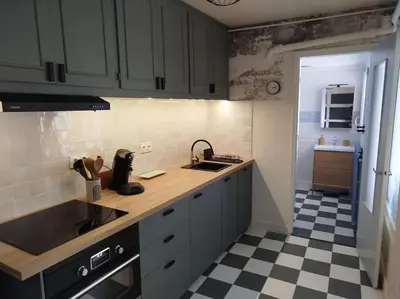 Cuisine ou kitchenette dans l'établissement Appartement plein centre avec terrasse