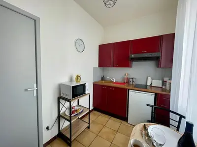Cuisine ou kitchenette dans l'établissement Cosy au Cœur de Dijon