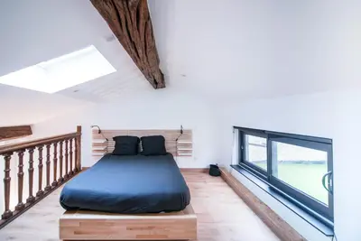 Un ou plusieurs lits dans un hébergement de l'établissement MyAppart71 - POP - Appartement en Coeur de Ville
