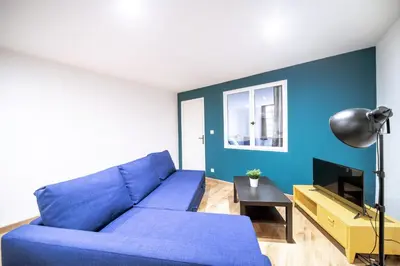 Coin salon dans l'établissement MyAppart71 - POP - Appartement en Coeur de Ville