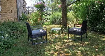 Jardin de l'établissement Petit logement cosy et son exterieur entièrement indépendant