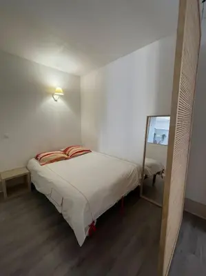 Un ou plusieurs lits dans un hébergement de l'établissement Appartement - Dijon centre