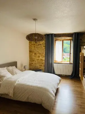 Un ou plusieurs lits dans un hébergement de l'établissement La Maison Cosy