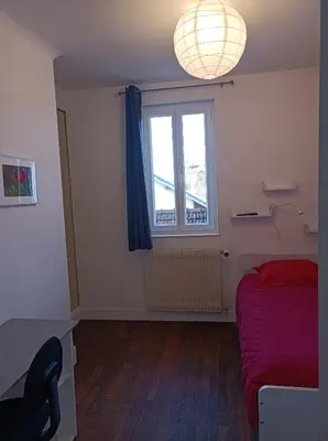 Coin salon dans l'établissement Gîte de la fontaine