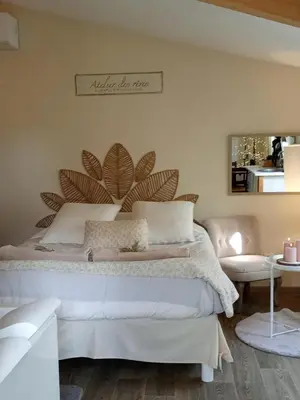 Un ou plusieurs lits dans un hébergement de l'établissement L'atelier des rêves Un moment magique spa privé