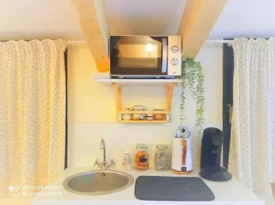 Cuisine ou kitchenette dans l'établissement L'atelier des rêves Un moment magique spa privé