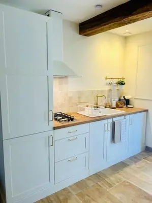 Cuisine ou kitchenette dans l'établissement Le Cocon