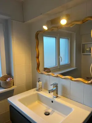 Salle de bains dans l'établissement Le Corail