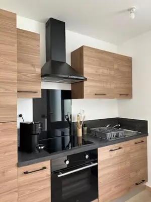 Cuisine ou kitchenette dans l'établissement Studio des Combes