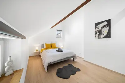 Un ou plusieurs lits dans un hébergement de l'établissement Le Duplex Moutarde, prox centre et Gare, 50m2, climatisation