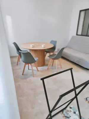 Coin salon dans l'établissement Maisonnette - Charme Cœur de Vigne