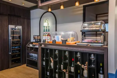 Cuisine ou kitchenette dans l'établissement Hôtel de France - Beaune
