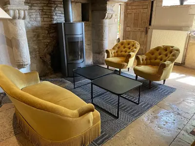 Coin salon dans l'établissement Gîte d'exception - Manoir de Sacquenay