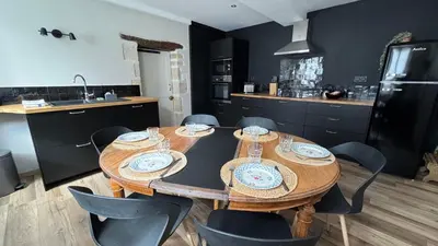 Cuisine ou kitchenette dans l'établissement Gîte 