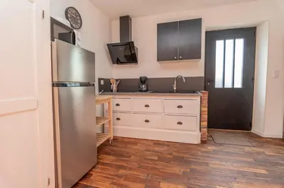 Cuisine ou kitchenette dans l'établissement L'appartement de Marie - Appt avec terrasse