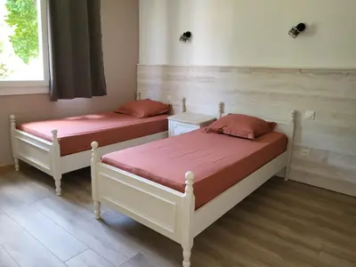 Un ou plusieurs lits dans un hébergement de l'établissement Gite Le Creusot - 4 Chambres individuelles