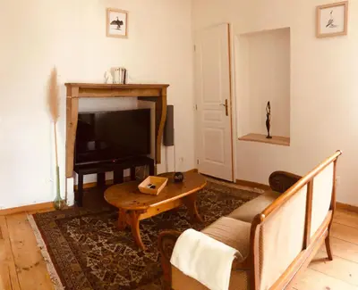 Coin salon dans l'établissement Appartement Hirondelle