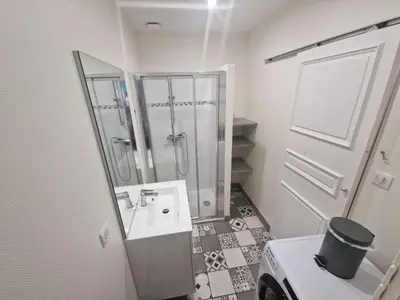 Salle de bains dans l'établissement Le Mandarin