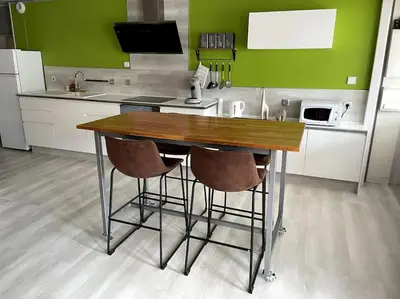 Cuisine ou kitchenette dans l'établissement Maison au coeur du village