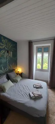 Un ou plusieurs lits dans un hébergement de l'établissement A la Ferme du Trembloy
