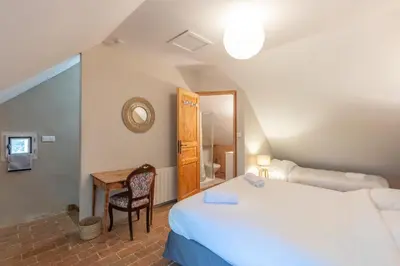 Un ou plusieurs lits dans un hébergement de l'établissement Cabana & La Maison du Père Amour