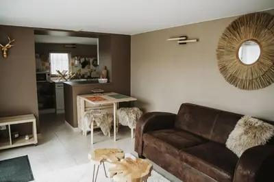 Coin salon dans l'établissement Petite maison cosy Chez Georges