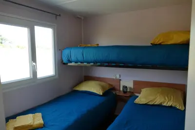 Un ou plusieurs lits dans un hébergement de l'établissement La lodge de l'étoile du berger