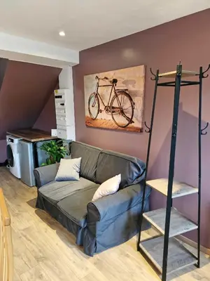 Coin salon dans l'établissement Maisonnette de la Butte de Thil