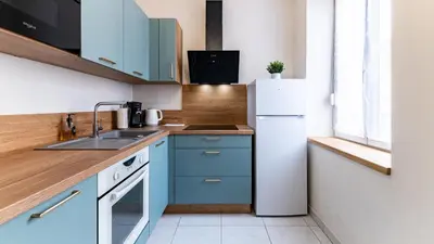 Cuisine ou kitchenette dans l'établissement Le Chouette Toucan