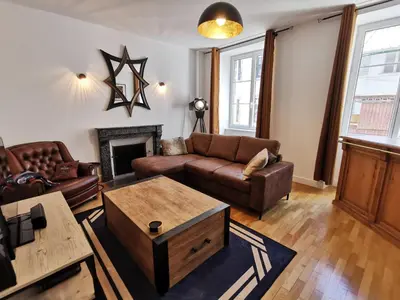Coin salon dans l'établissement Appartement 3 chambres au cœur du Jura, idéal famille