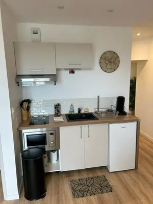 Cuisine ou kitchenette dans l'établissement Le Prisséen