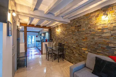 Coin salon dans l'établissement Strike & Chill - Duplex - Au Cœur de Dijon