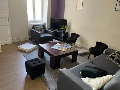 Coin salon dans l'établissement Appartement centre ville Charolles