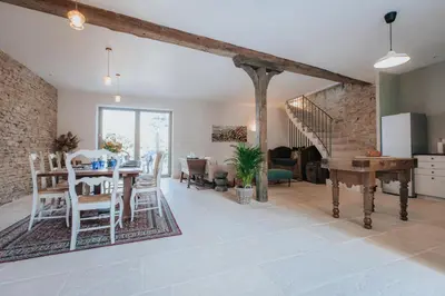 Coin salon dans l'établissement La Vieille Ferme de Tassigny