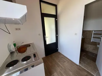 Cuisine ou kitchenette dans l'établissement Ushuaïa Villages-Domaine de Scott