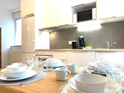 Cuisine ou kitchenette dans l'établissement Appart'Village Le Creusot centre - Parking facile - Bus gare TGV 17 min