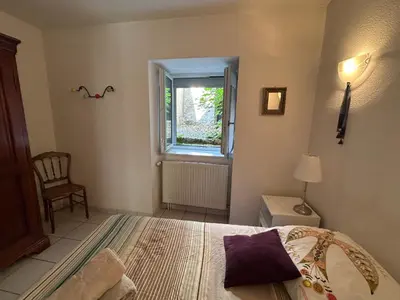 Un ou plusieurs lits dans un hébergement de l'établissement Eden un jardin au cœur du village