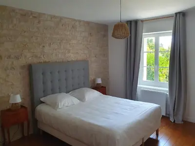 Un ou plusieurs lits dans un hébergement de l'établissement Gîte Le Pavillon Vougeot - Romanée - SPA