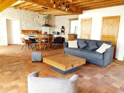 Coin salon dans l'établissement Gîte Le Pavillon Vougeot - Romanée - SPA