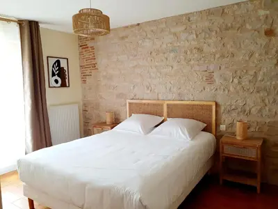 Un ou plusieurs lits dans un hébergement de l'établissement Gîte Le Pavillon Vougeot - Romanée - SPA