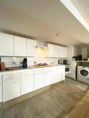 Cuisine ou kitchenette dans l'établissement Le repos Bressan