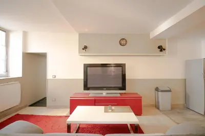 Télévision ou salle de divertissement dans l'établissement Le repos Bressan