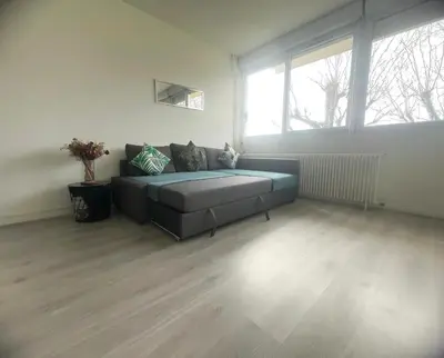Coin salon dans l'établissement Appartement Le Classik' PARKING PRIVÉ