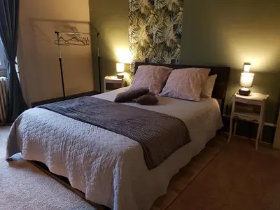 Un ou plusieurs lits dans un hébergement de l'établissement Le Chateau