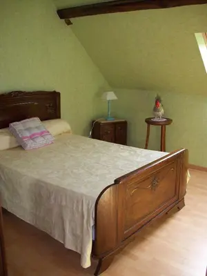 Un ou plusieurs lits dans un hébergement de l'établissement chambre d hotes les jonquilles