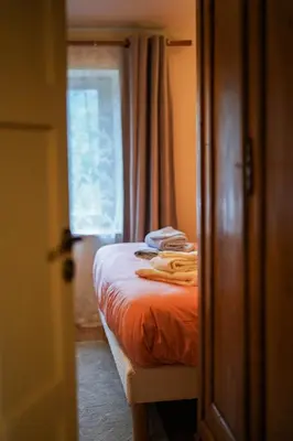 Un ou plusieurs lits dans un hébergement de l'établissement Le Petit Paradis de Pruzilly