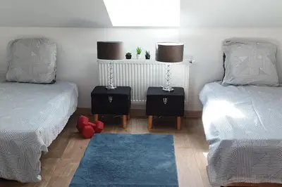 Un ou plusieurs lits dans un hébergement de l'établissement l' immeuble Booking à Chalon sur Saône