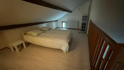 Un ou plusieurs lits dans un hébergement de l'établissement Maison 110 m2 - 3 chambres - 7 couchages - 5 min Dole