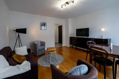 Télévision ou salle de divertissement dans l'établissement Chez André